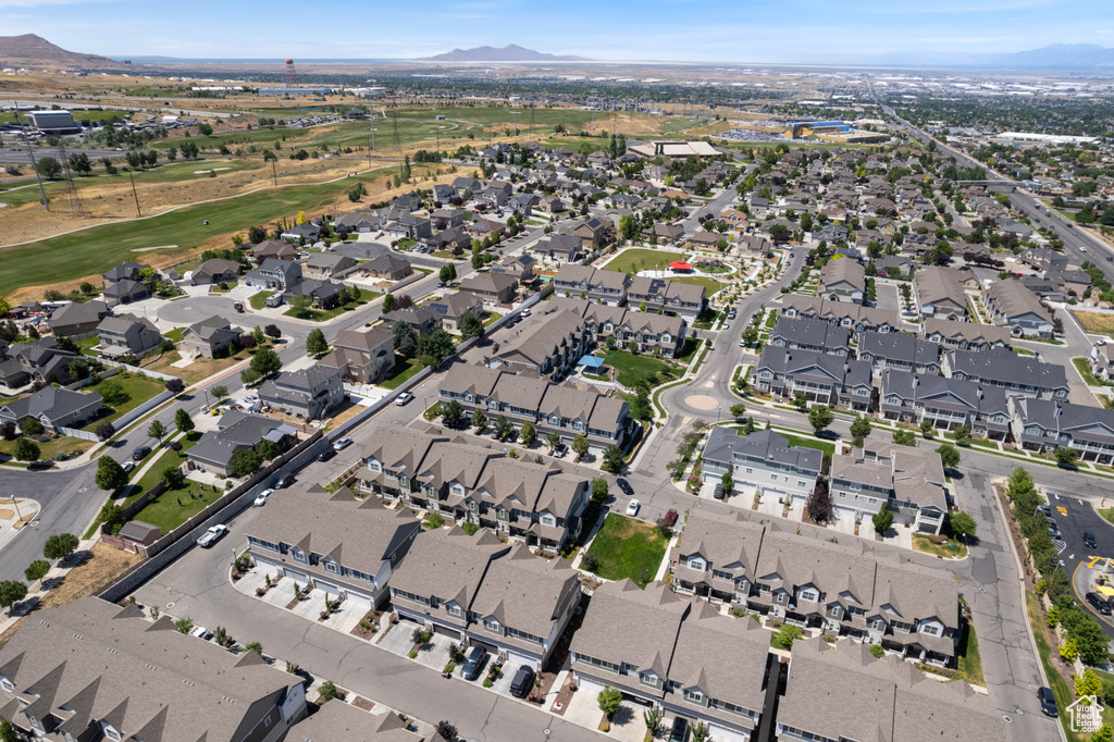 Aerial overview of property\\\\\\\'s location featuring a mountain backdrop and nearby suburban area