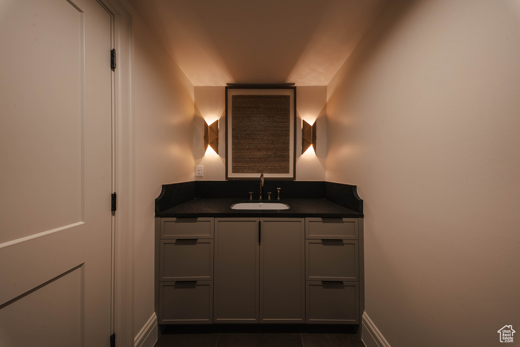 Bathroom featuring vanity and tile patterned floors
