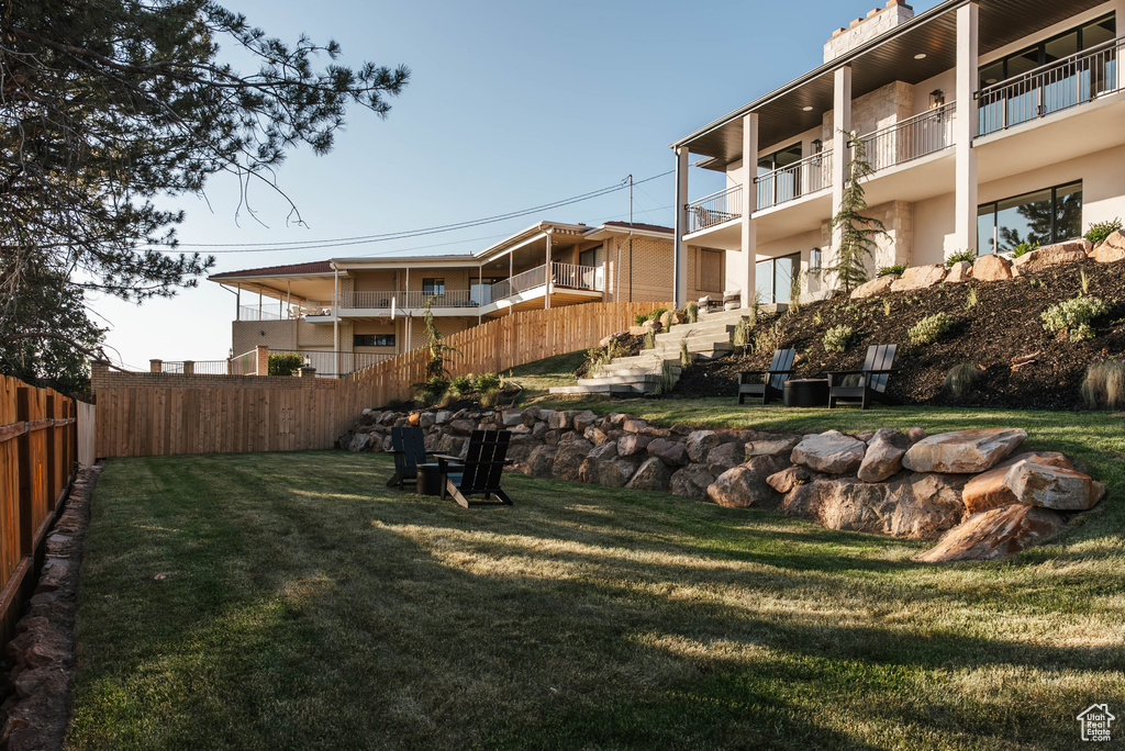 View of fenced backyard