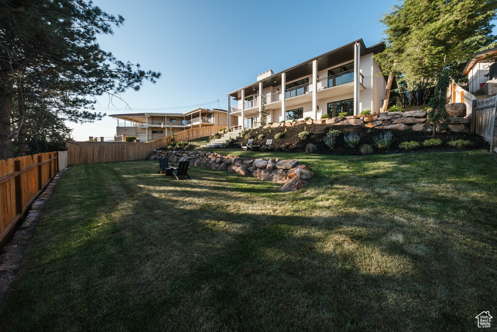 View of fenced backyard