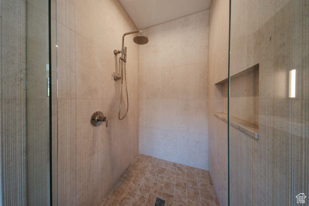 Bathroom with tiled shower