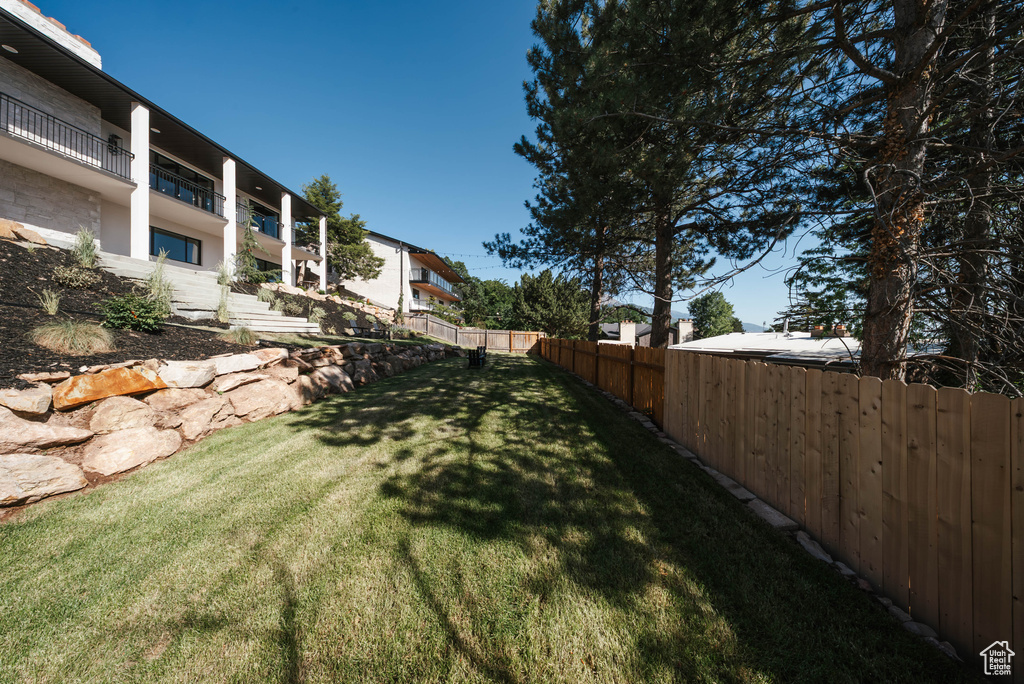 View of fenced backyard