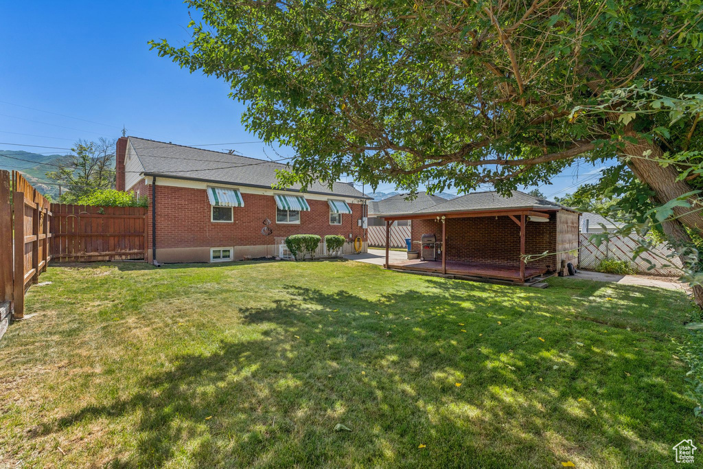 View of fenced backyard
