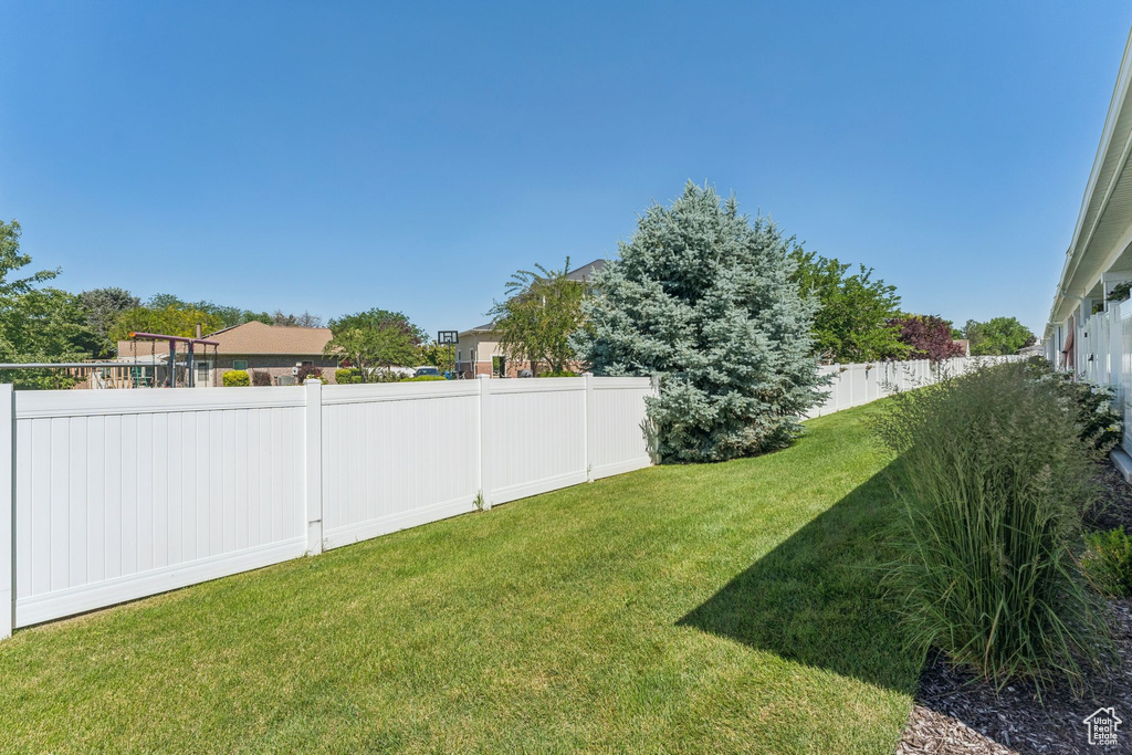 View of fenced backyard