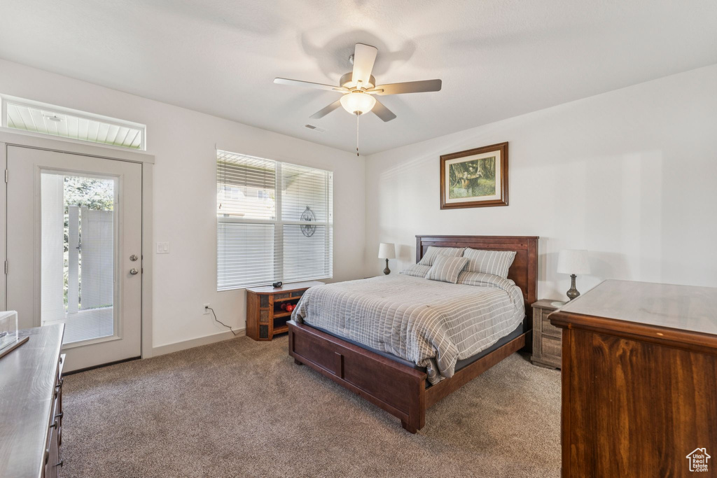 Bedroom with carpet flooring and ceiling fan
