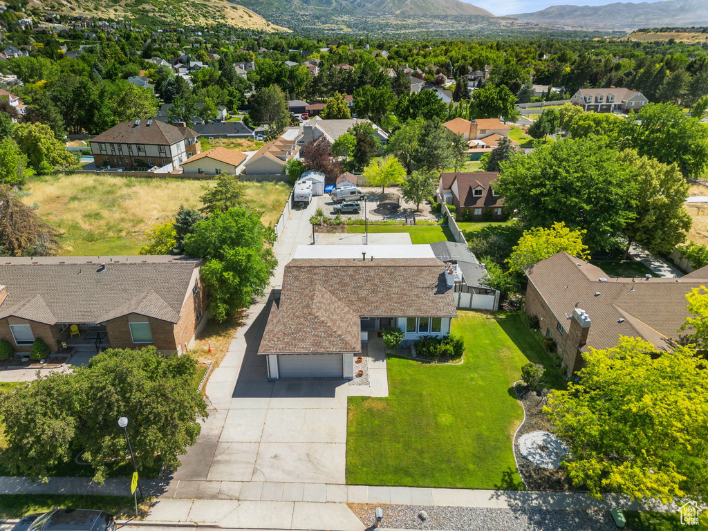 Aerial view of residential area with a mountain backdrop