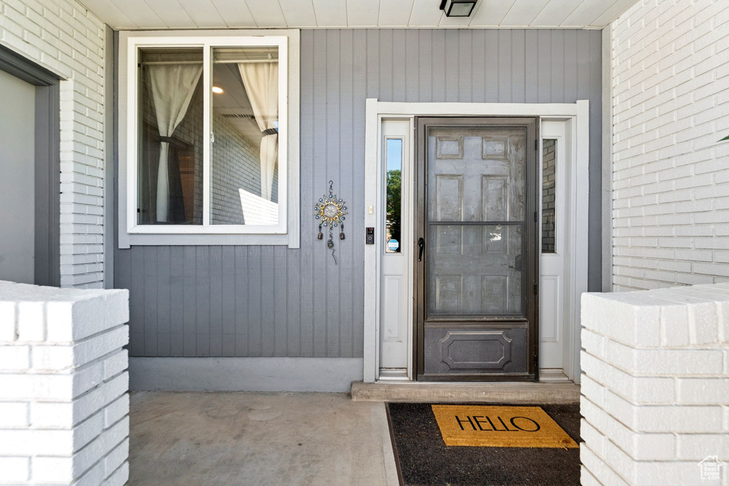 Property entrance featuring a porch