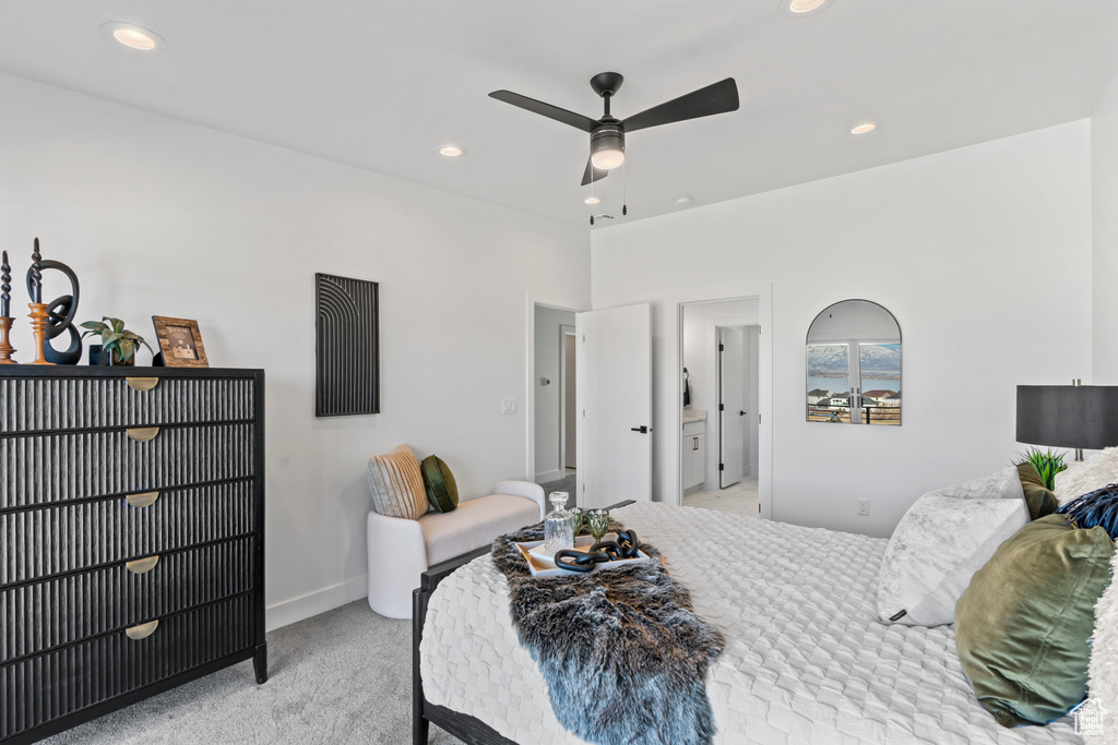 Bedroom featuring light colored carpet, recessed lighting, and ceiling fan