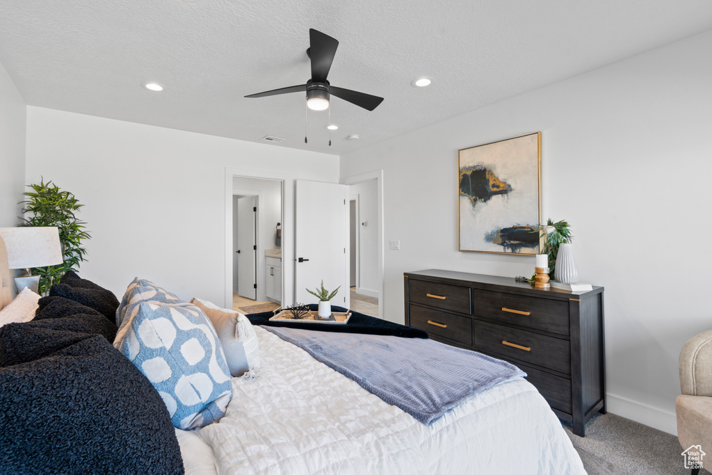 Bedroom featuring light colored carpet, recessed lighting, and a ceiling fan