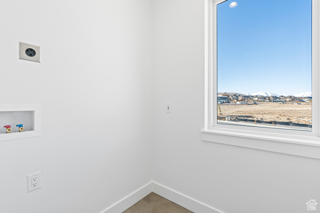 Laundry room featuring hookup for an electric dryer and washer hookup