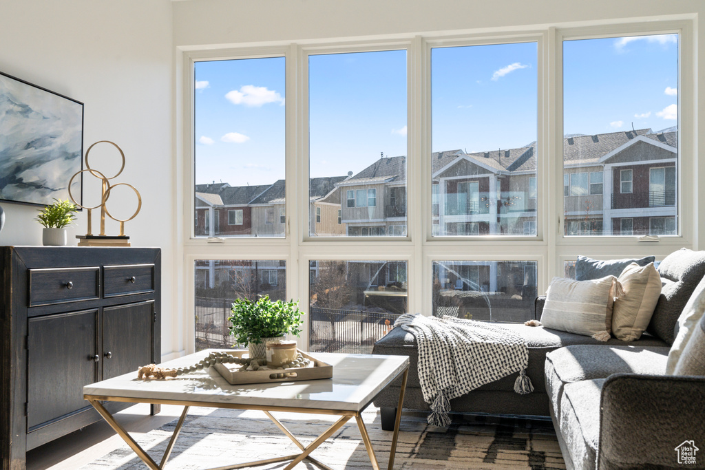 Sunroom / solarium featuring a residential view
