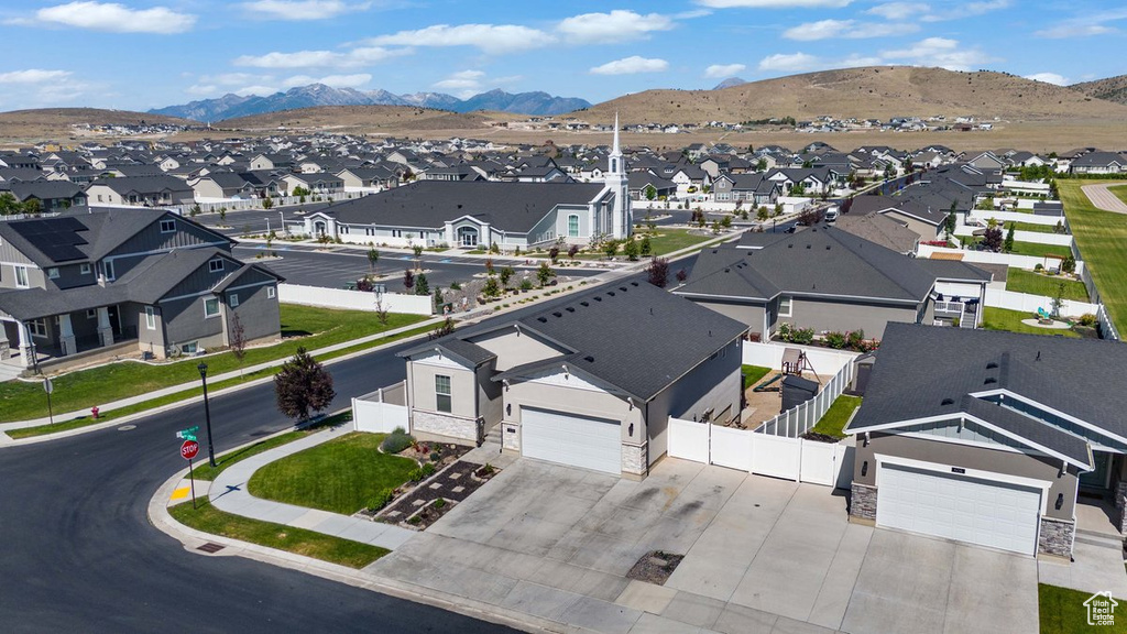 Aerial perspective of suburban area with mountains