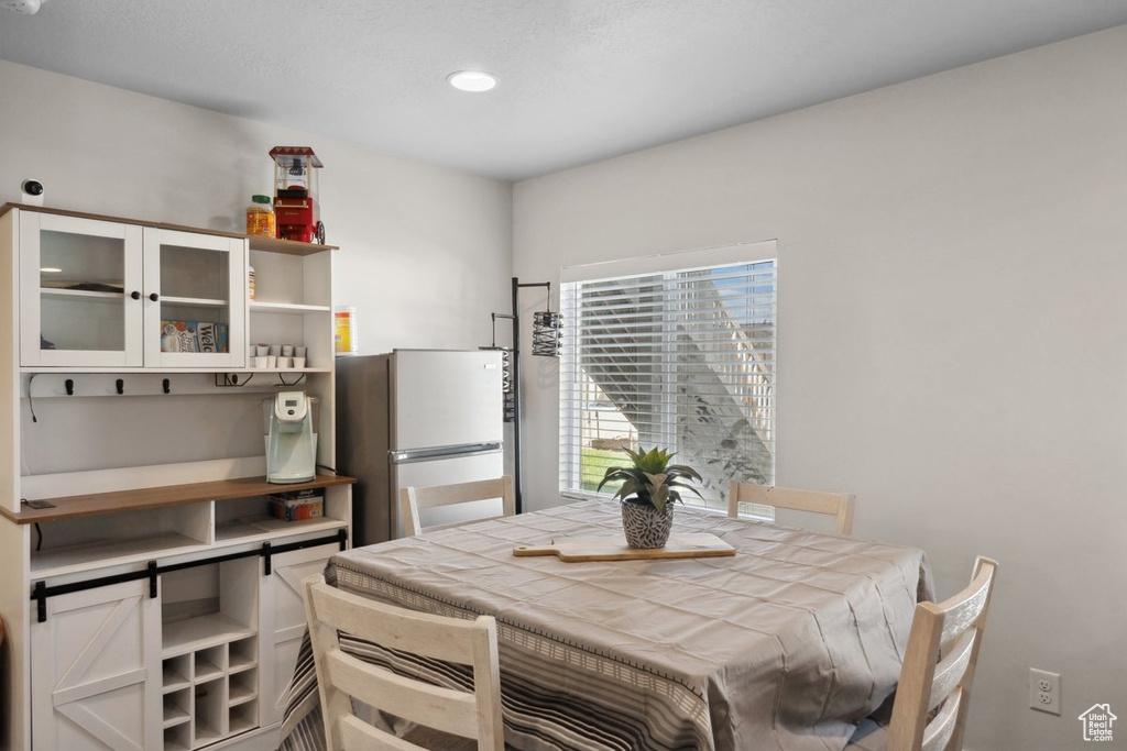 Dining space with recessed lighting