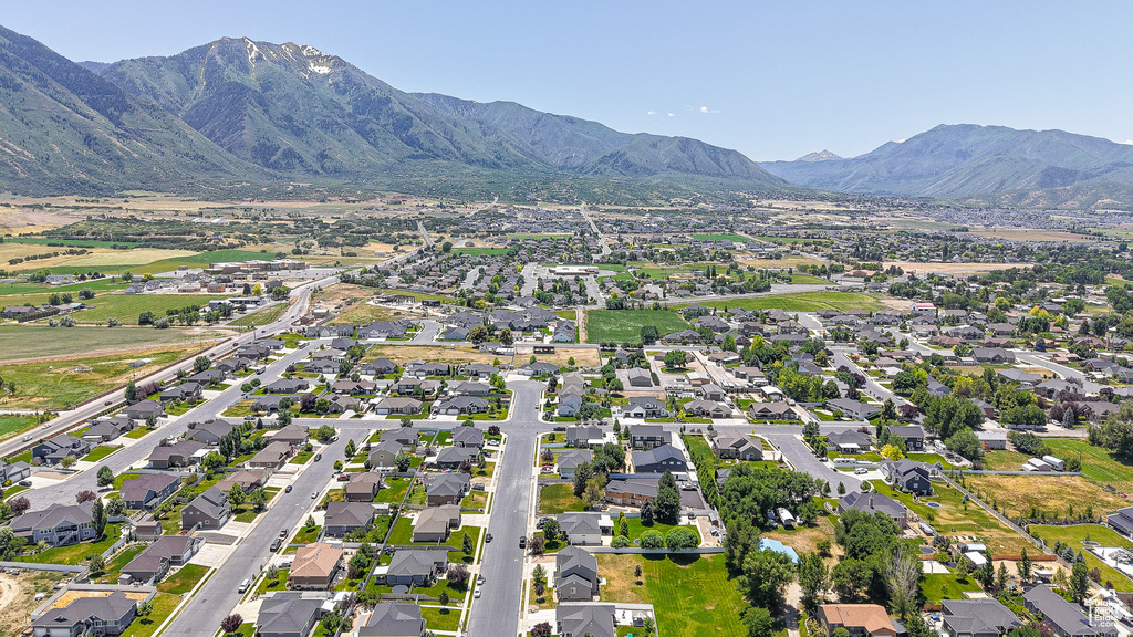 Aerial view of residential area with a mountain backdrop