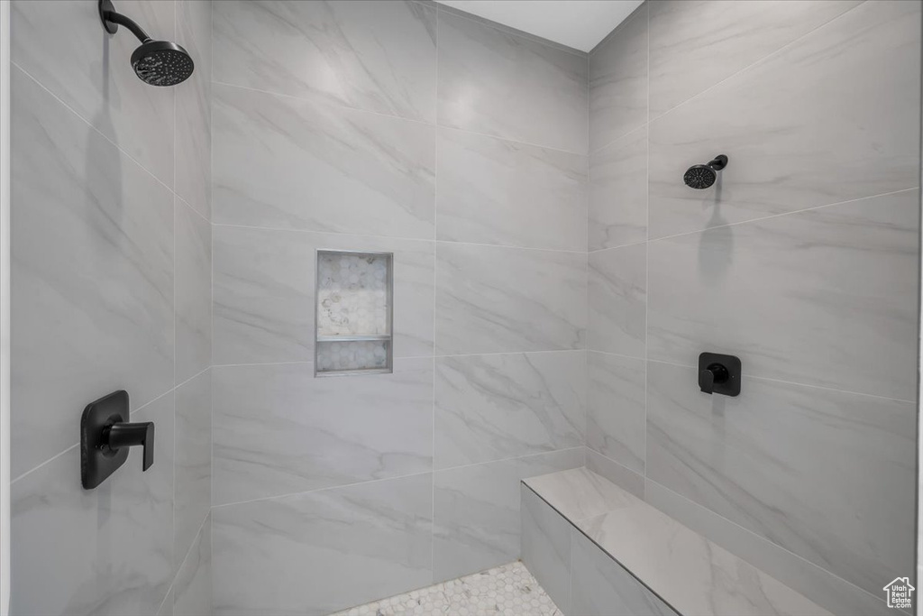 Bathroom with tiled shower