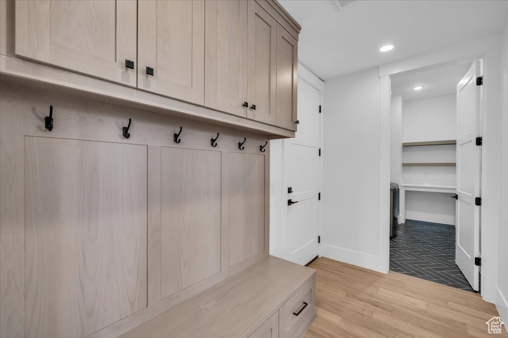 Mudroom featuring light wood-style floors and recessed lighting