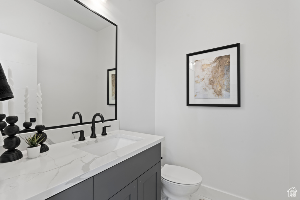 Bathroom with vanity and toilet