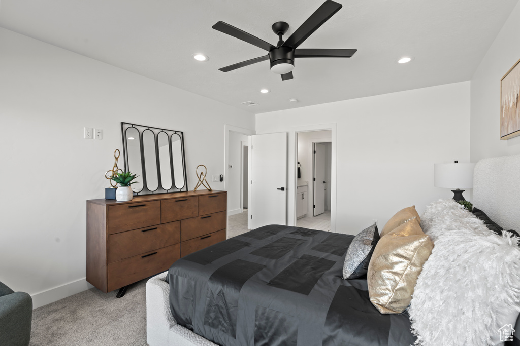 Bedroom featuring light carpet, recessed lighting, and a ceiling fan