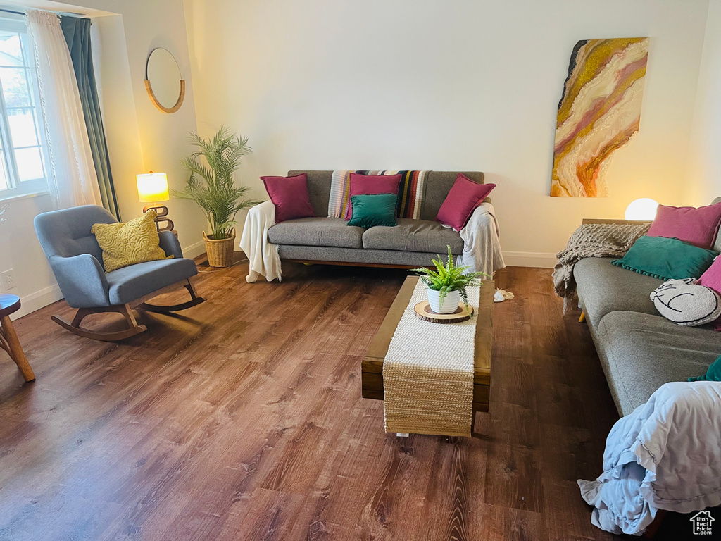 Living room featuring wood finished floors