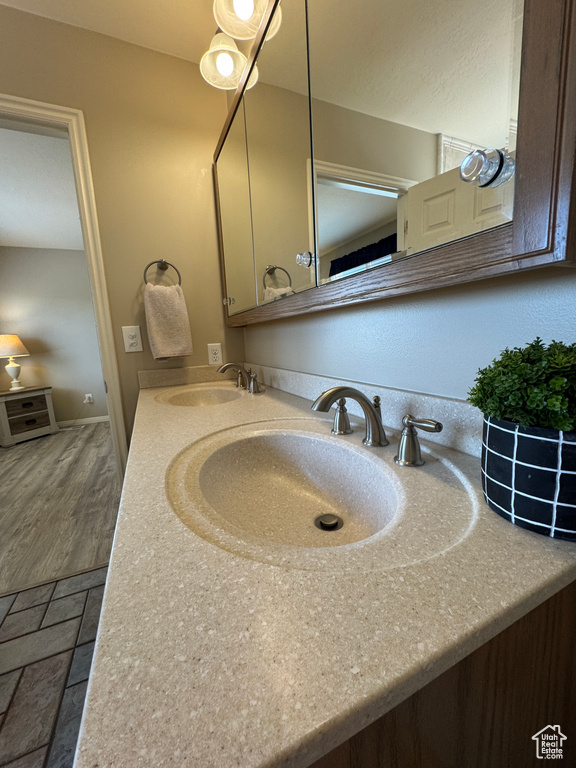 Bathroom featuring double vanity