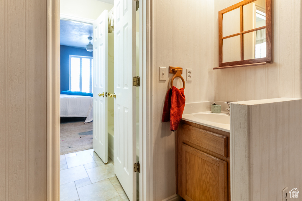 Bathroom featuring vanity and ensuite bathroom
