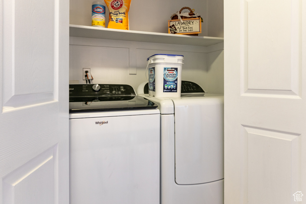 Laundry area featuring separate washer and dryer