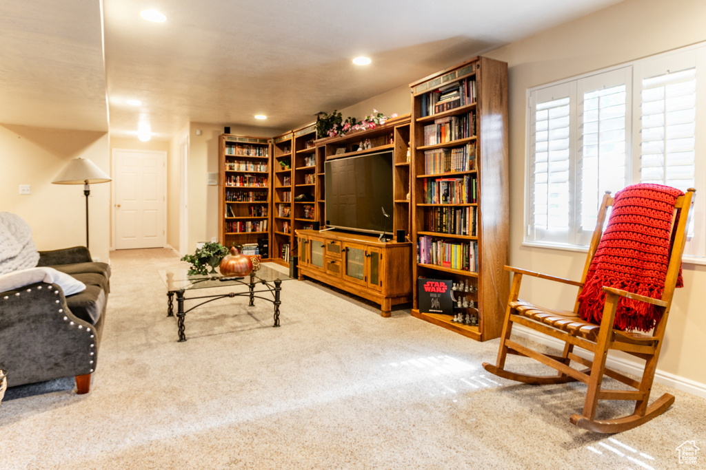 Sitting room featuring carpet and recessed lighting