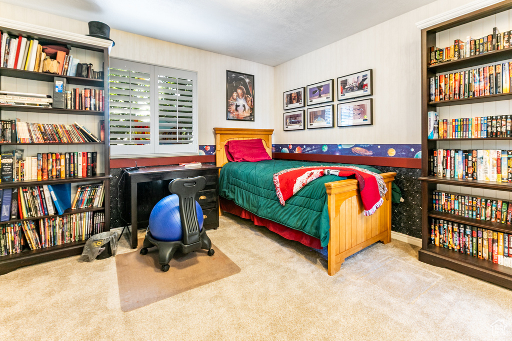 Bedroom featuring carpet