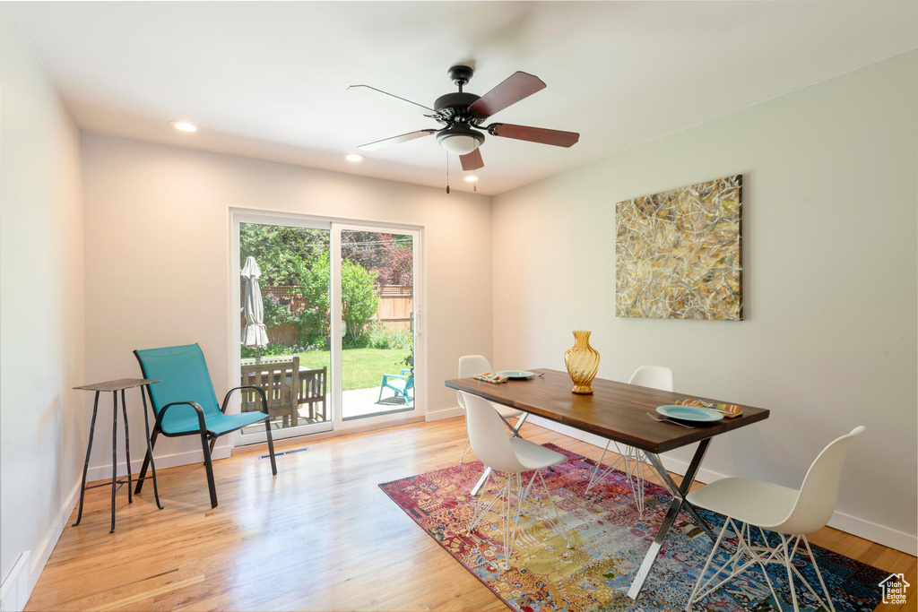 Office space featuring ceiling fan, light wood-style floors, and recessed lighting