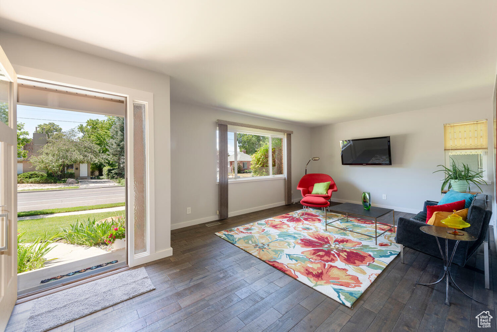 Living room featuring baseboards and wood finished floors