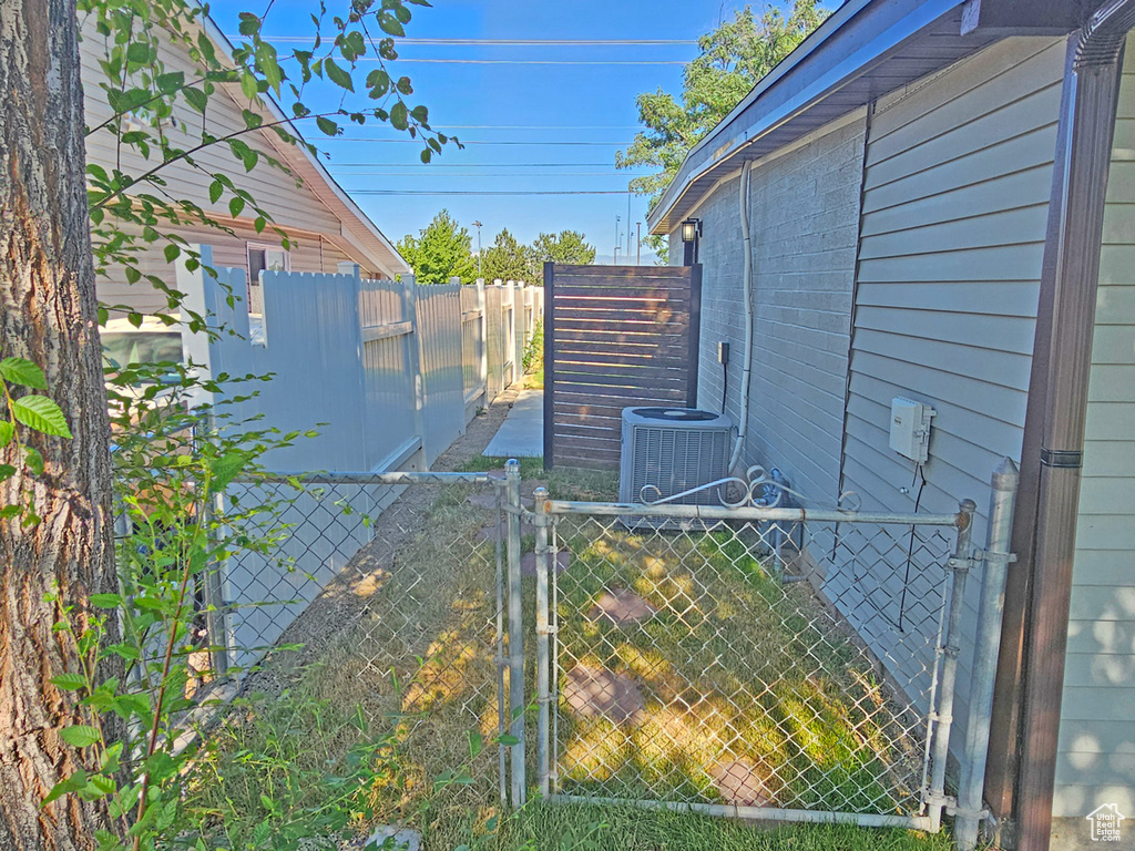 View of yard featuring a gate