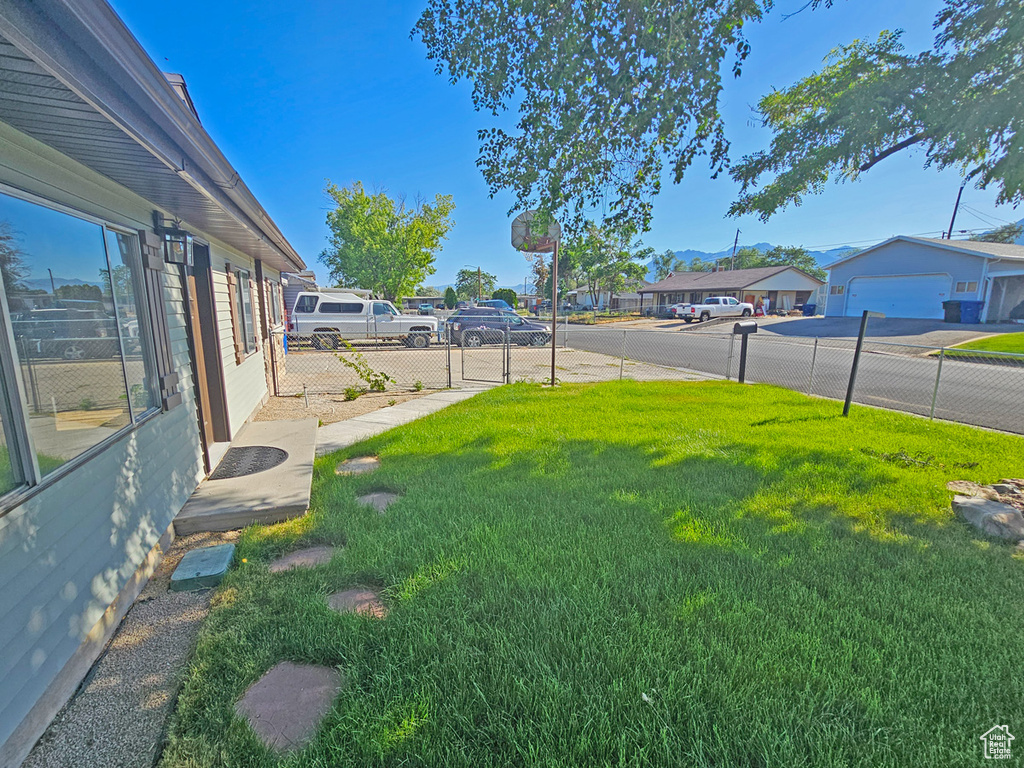 View of yard featuring a residential view