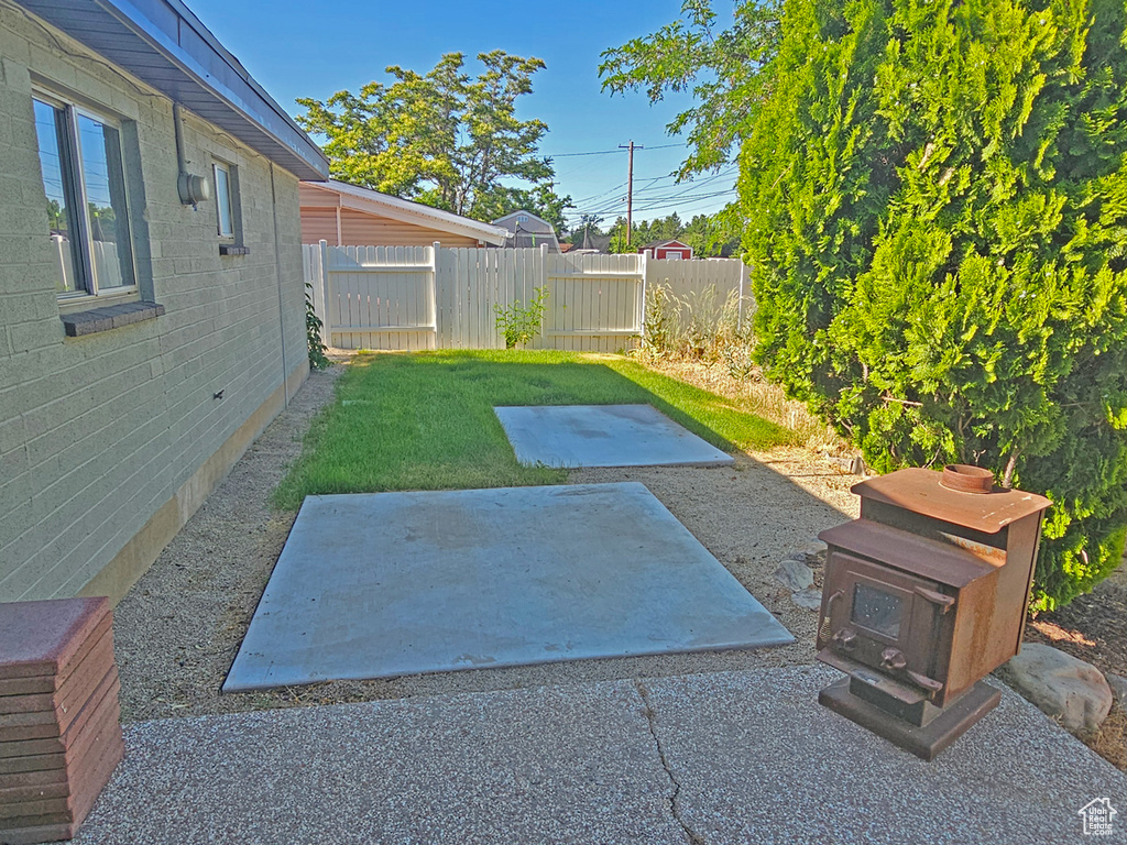 View of yard with a patio