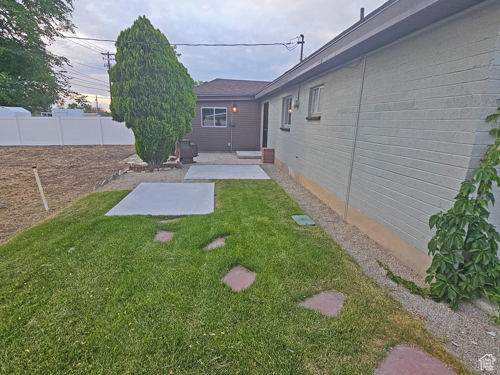 View of yard with a patio