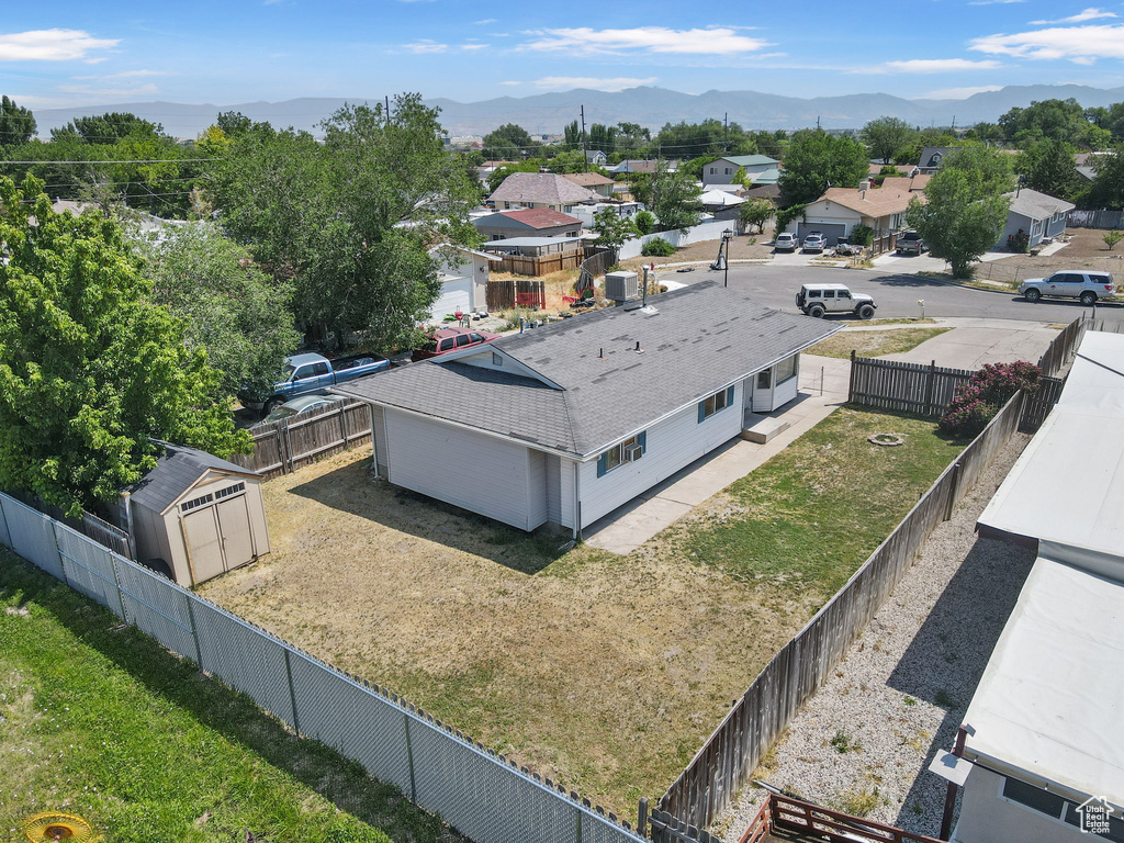 Aerial view of residential area with a mountain backdrop