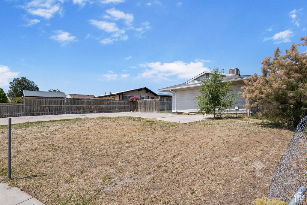View of yard with a patio area