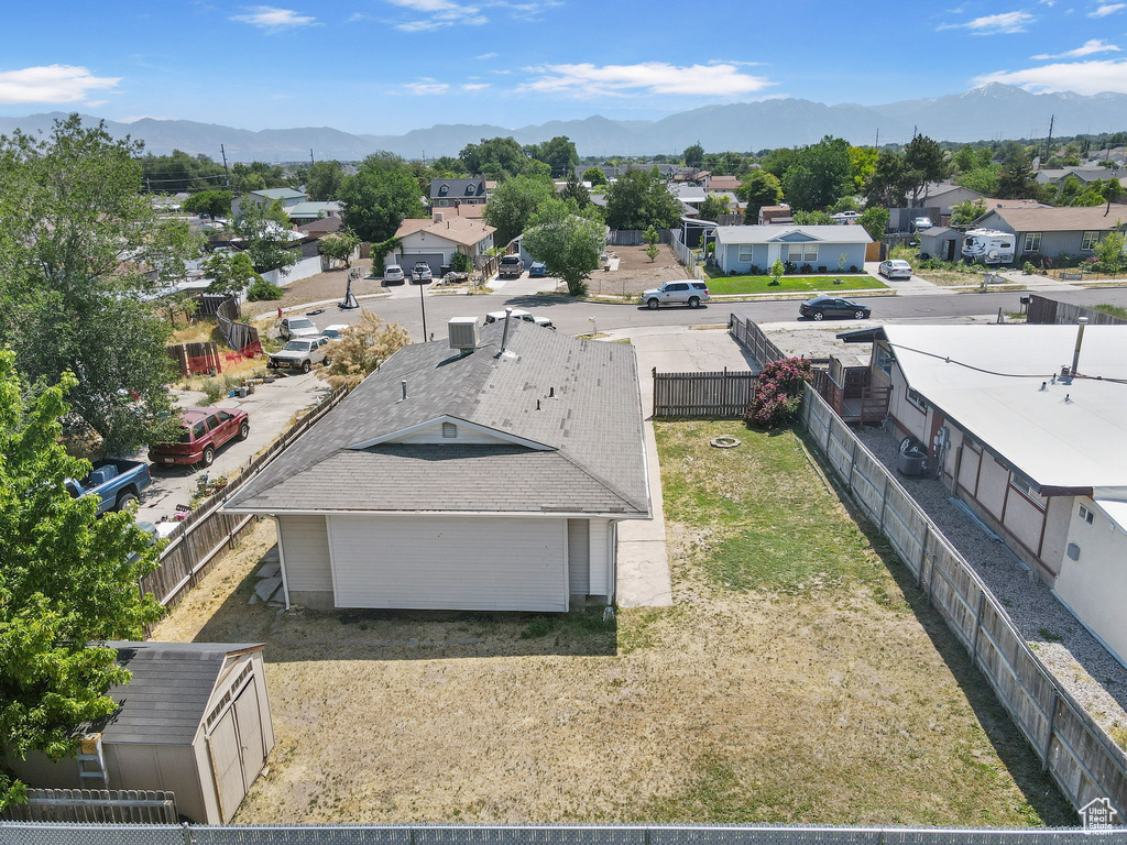 Aerial perspective of suburban area featuring mountains