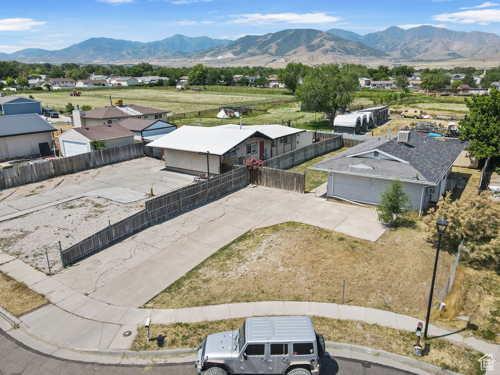 Aerial view of residential area featuring mountains