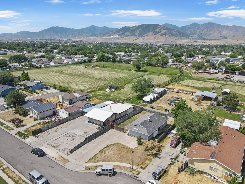 Aerial view of residential area featuring a mountain backdrop