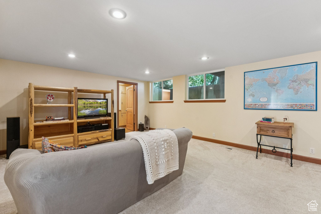Living room featuring recessed lighting and carpet flooring
