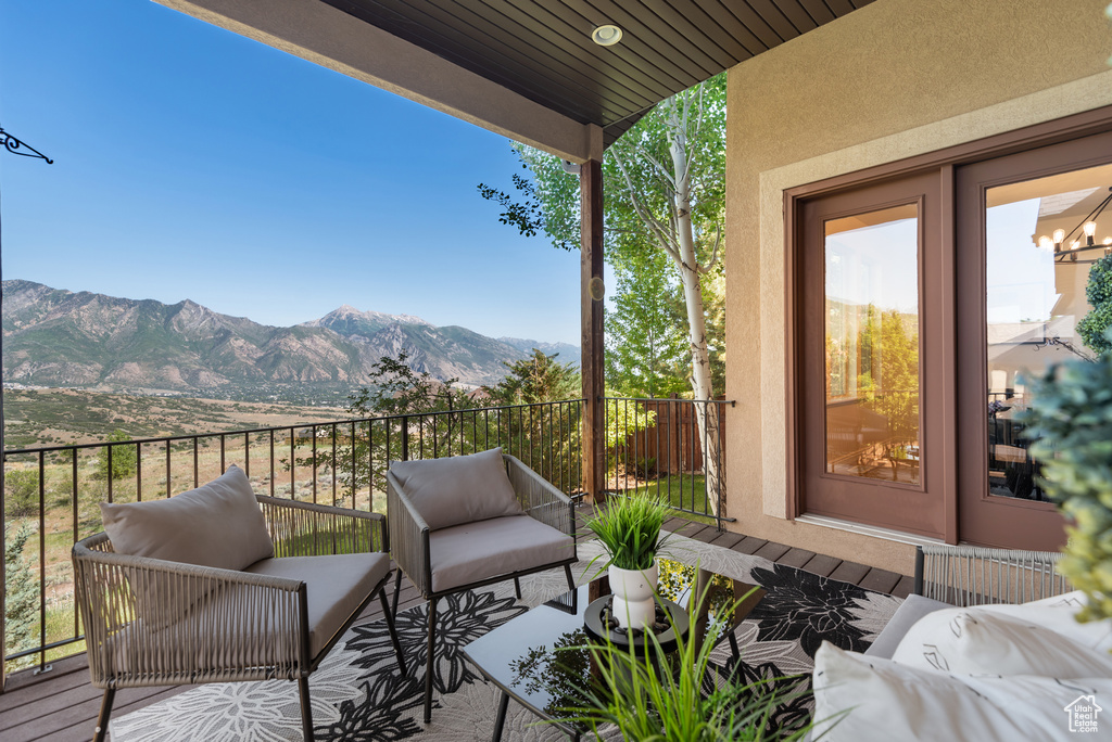 Patio / terrace with outdoor lounge area and a mountain view