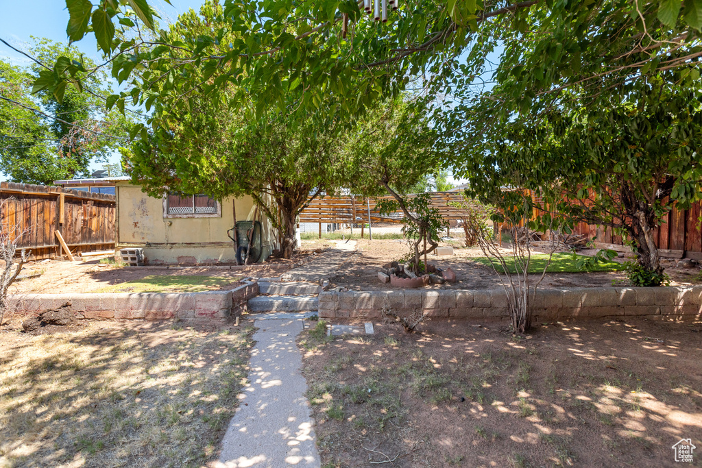 View of fenced backyard
