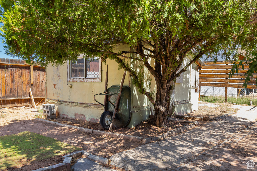 View of side of home featuring crawl space