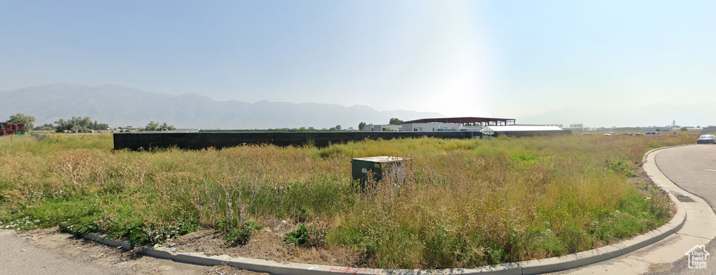 View of yard with a mountain view