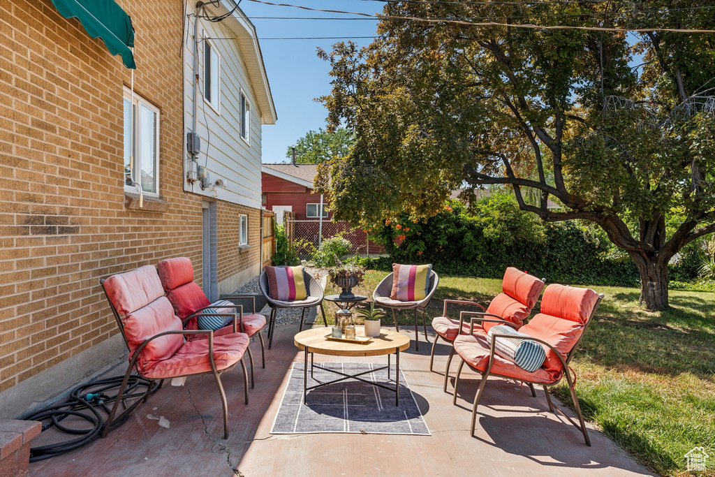 View of patio with an outdoor living space