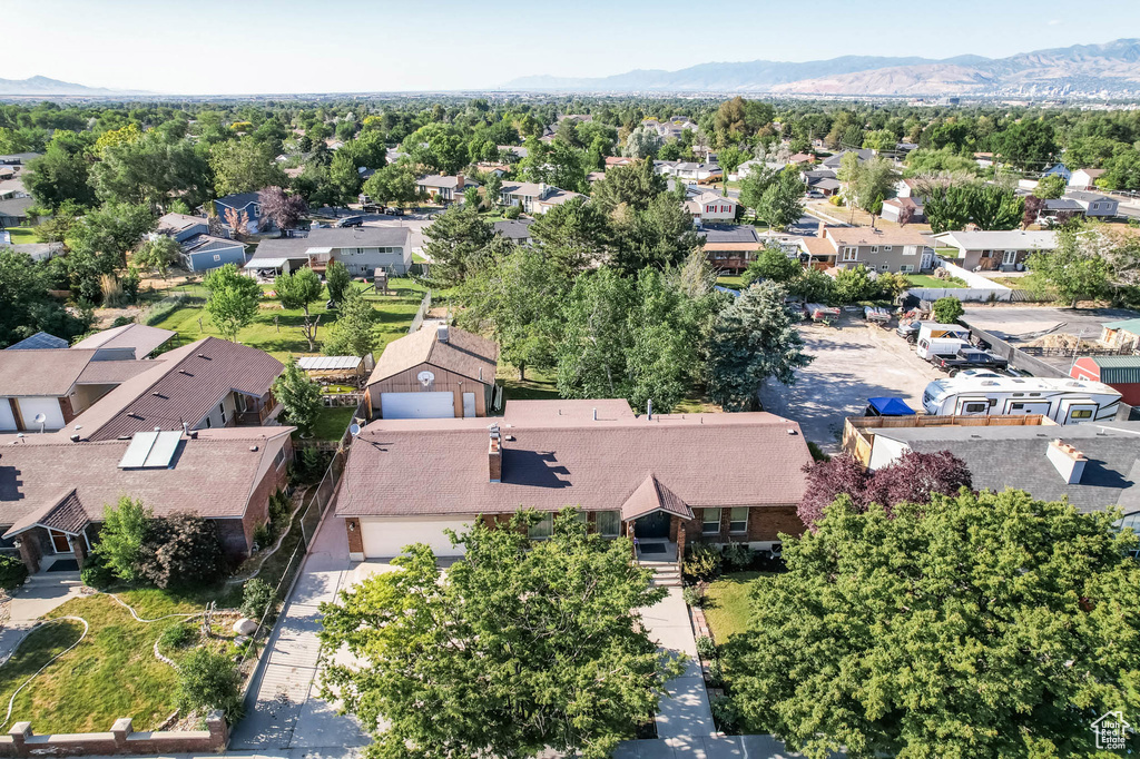 Aerial view of residential area with mountains
