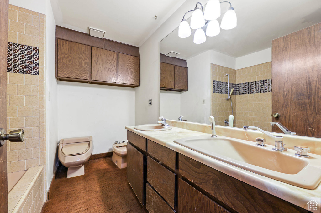 Bathroom with double vanity and a bidet