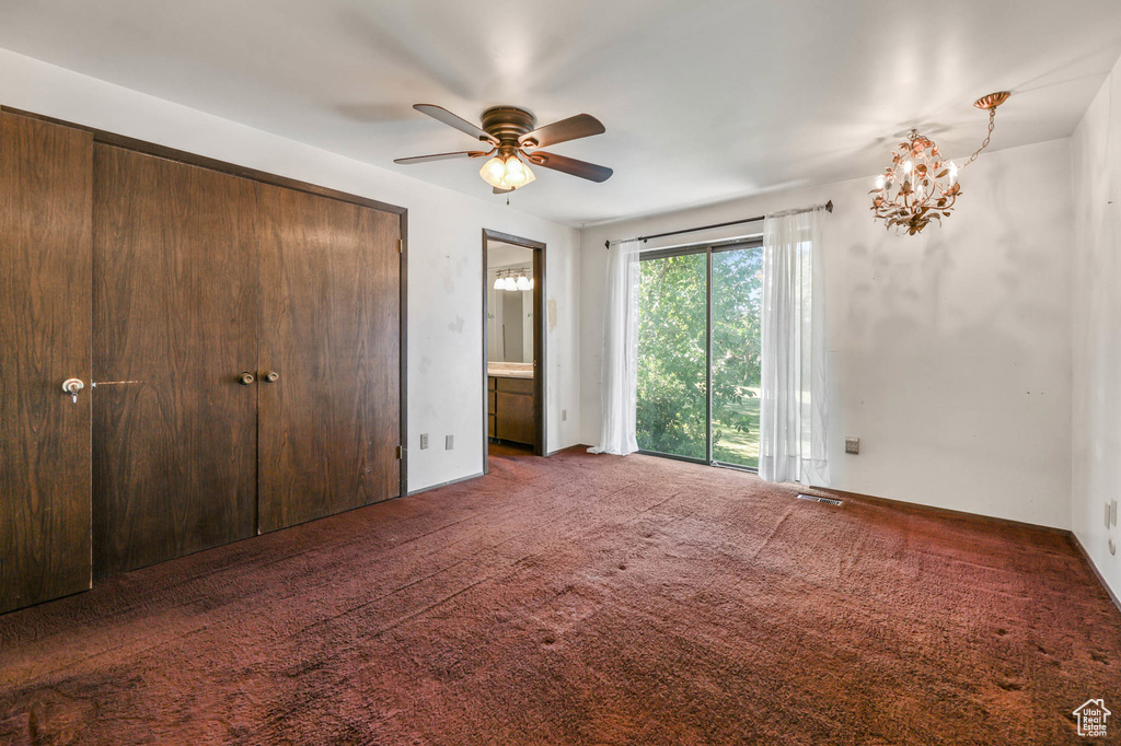 Unfurnished bedroom featuring carpet flooring and a ceiling fan