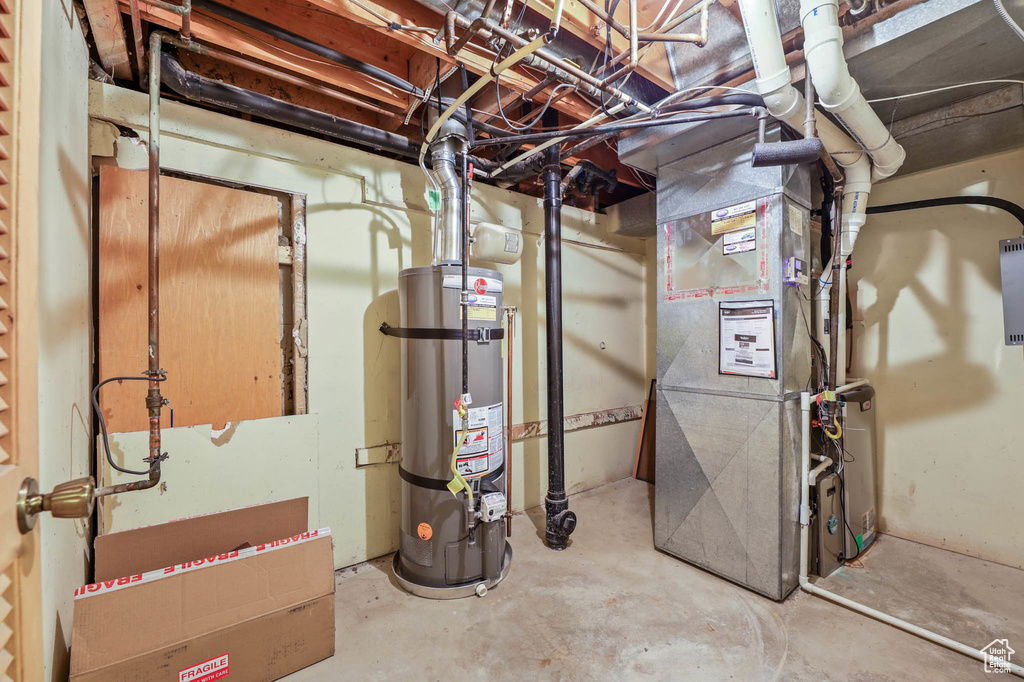 Unfinished below grade area with strapped water heater