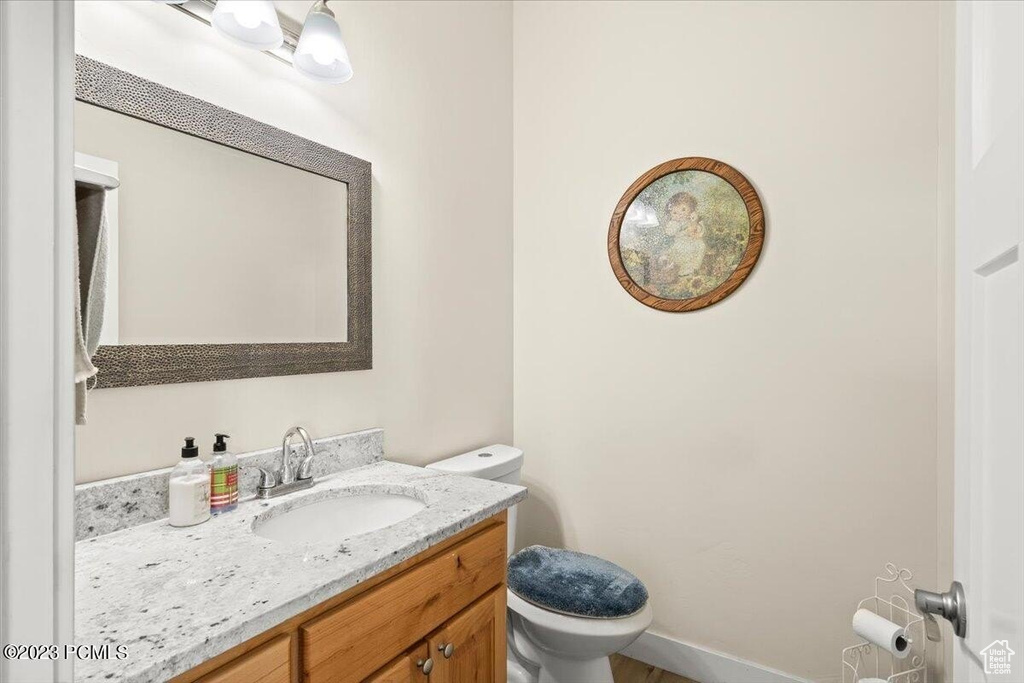 Bathroom featuring toilet and vanity